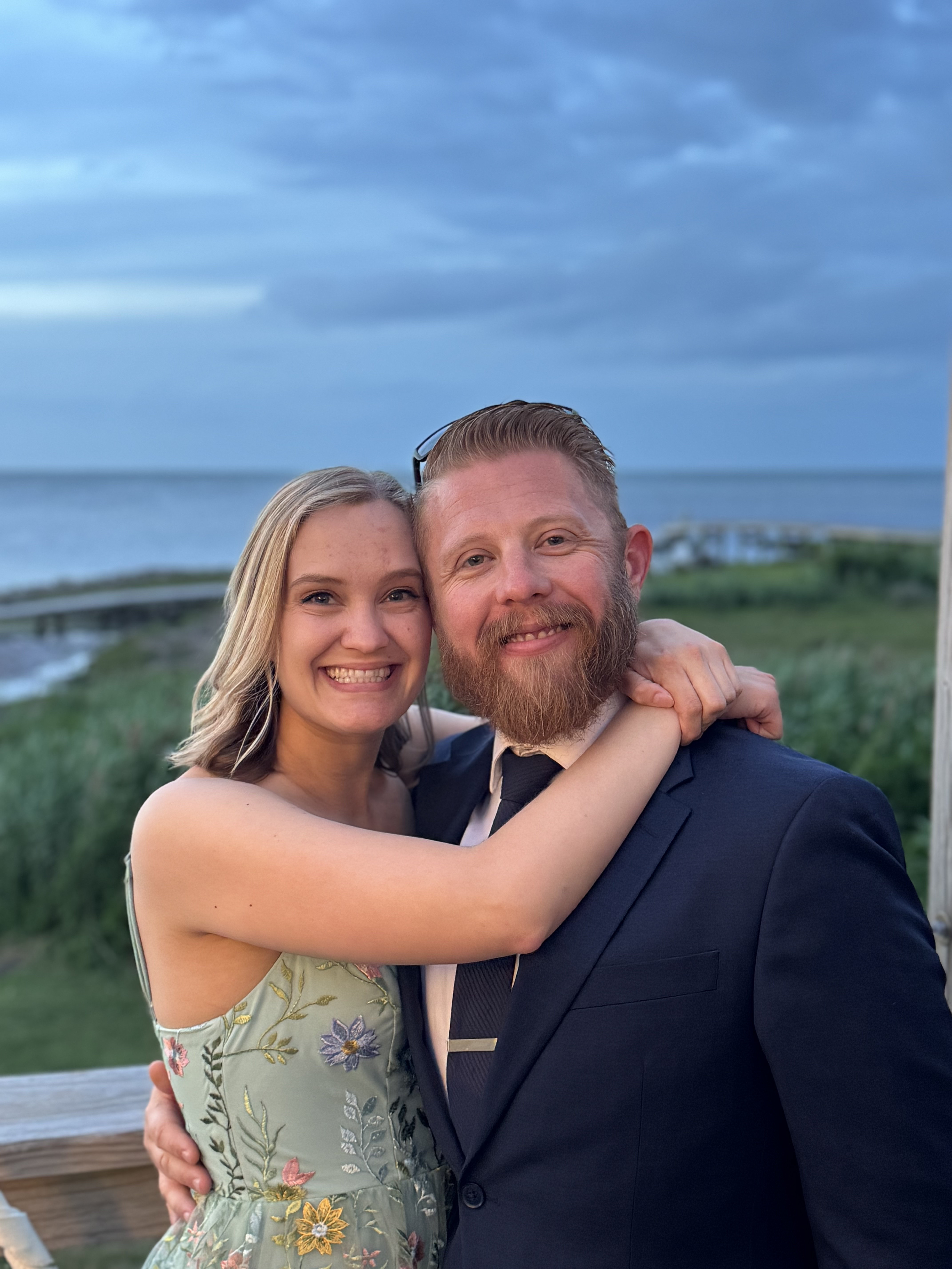 Strolling hand-in-hand along the beautiful windswept beaches of the Outer Banks.